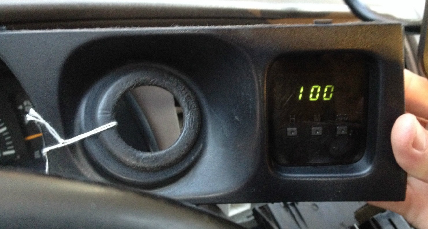 Used Toyota Oem Digital Clock + Bezel Tested 19952004 Part 8391035010 Green for Sale