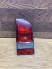 1989 OEM Geo Tracker/Suzuki Sidekick right hand tail light with bulbs/plug