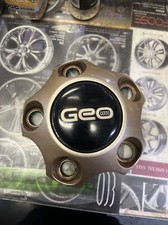 1999 2004 CHEVY Geo Tracker OEM Center Hub Cap 60177 30017383 Bronze