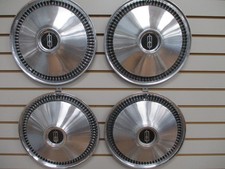 1966 1998 OLDSMOBILE Cutlass F85 88 Starfire WHEEL COVERS Hubcap OEM SET