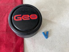 1989 1997 #V (1) - GEO TRACKER CENTER CAP RED logo 43252-56B00
