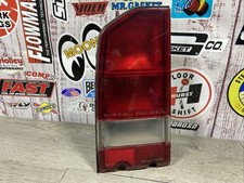1989 OEM Geo Tracker/Suzuki Sidekick Pass Left tail light with bulbs/plug